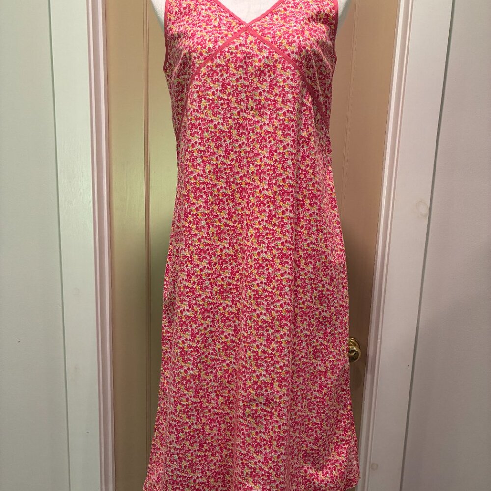Multi-colored flowered, sleeveless, cotton dress by Karavan. New, size small.